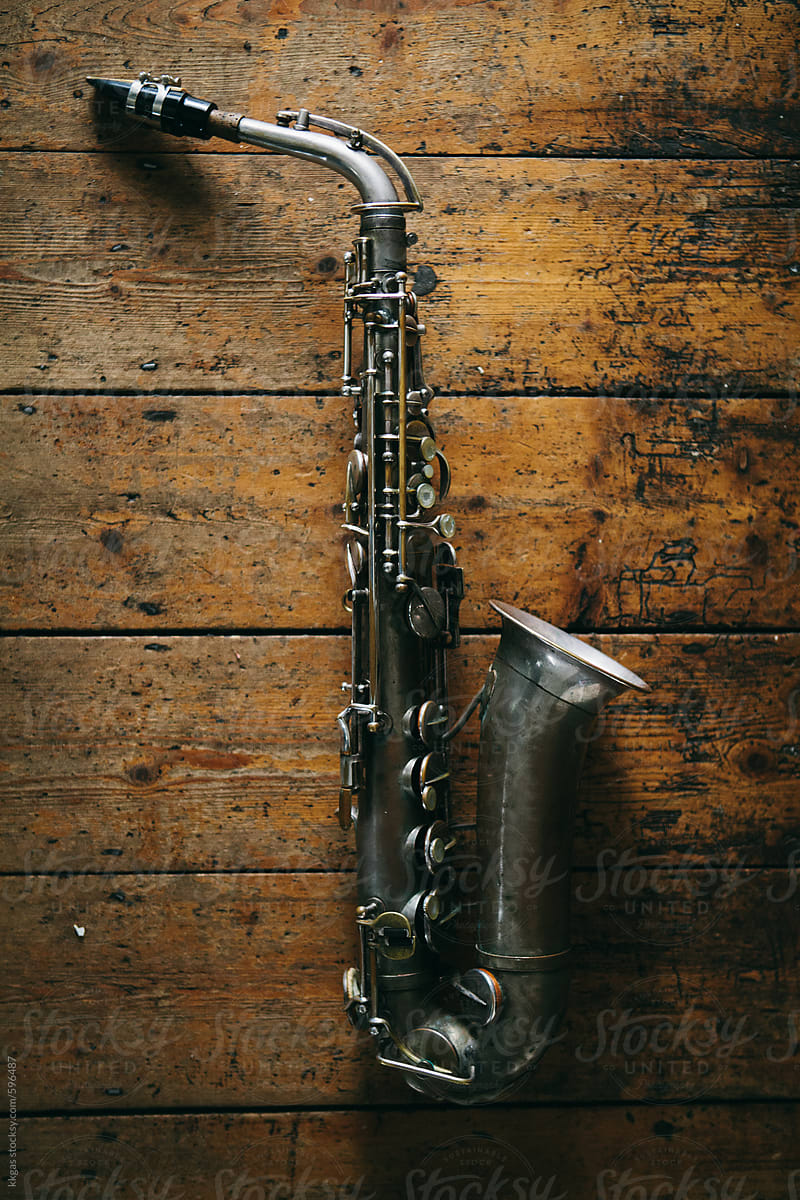 Saxophone on wood.