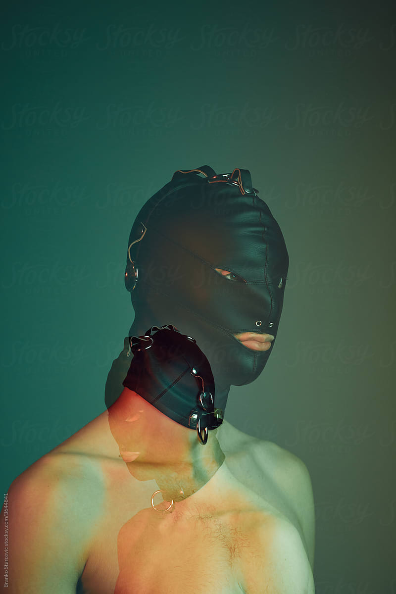Man wearing a black mask.