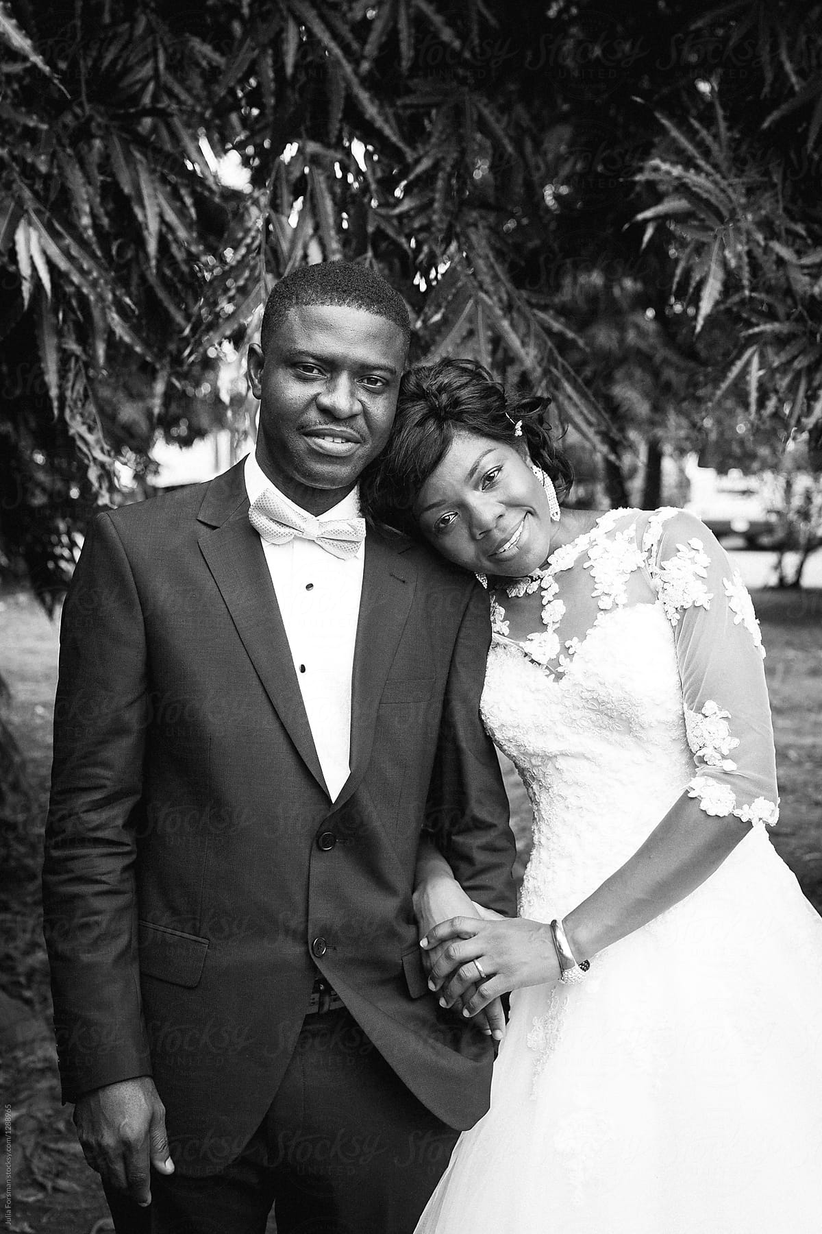Black and white relaxed portrait of bride and groom.