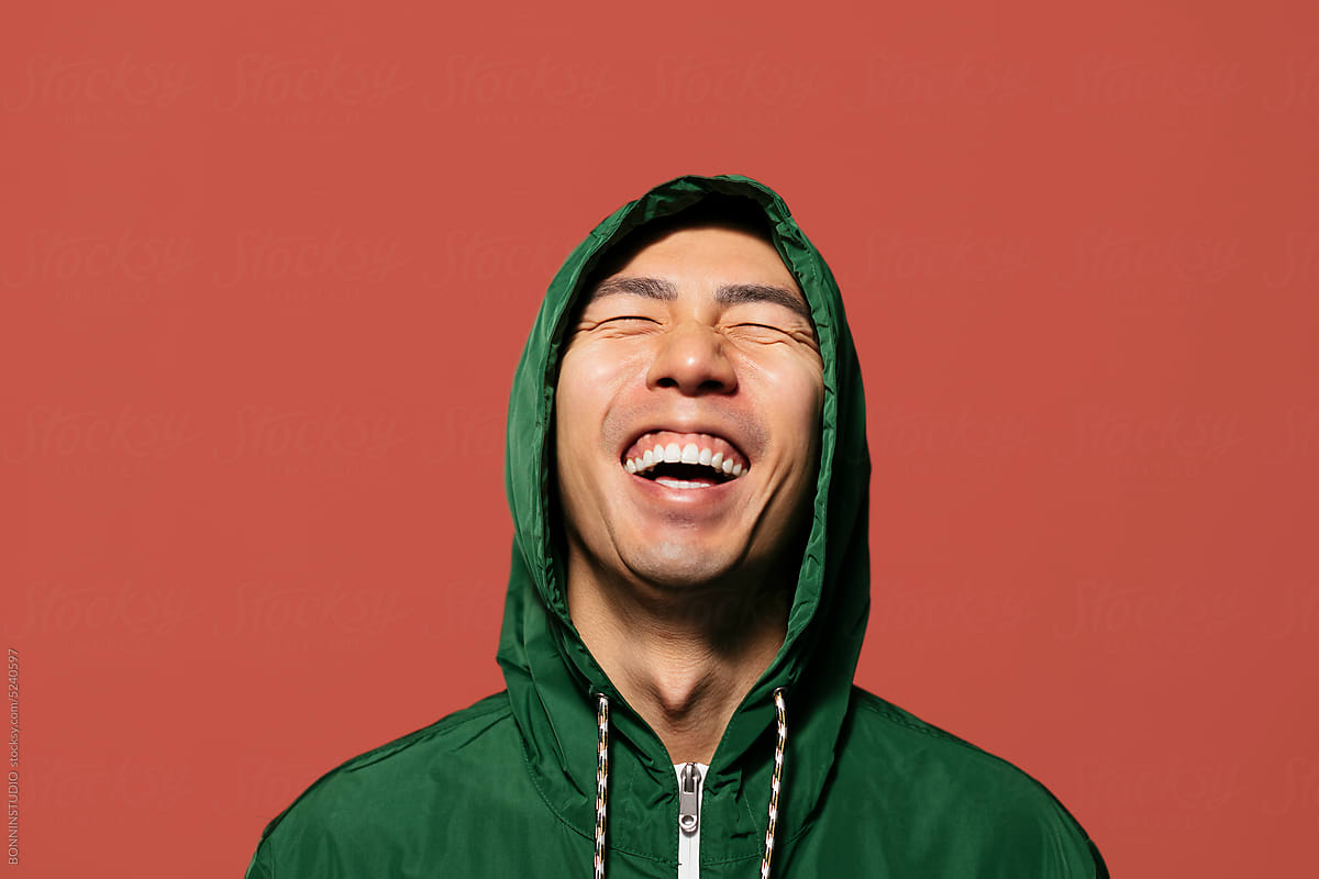 Funny man on vibrant red background