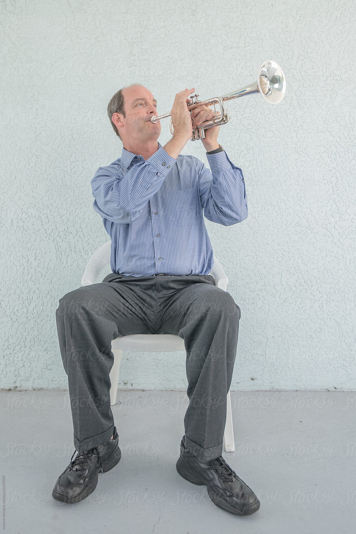 Portrait of a Musician and his Trumpet