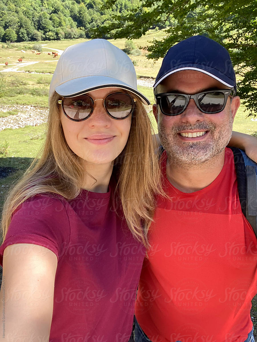 Selfie Of Couple Hiking In The Nature