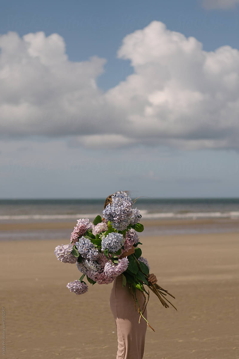 Beautiful big bouquet of flowers on the beach