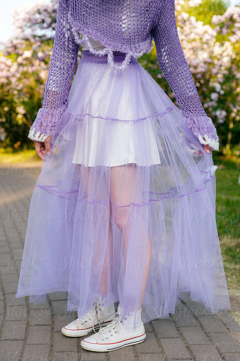 Crop woman in purple wedding dress