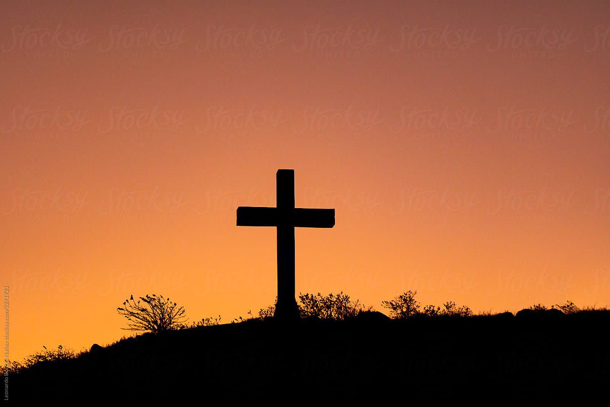 Cross with sunset in the background