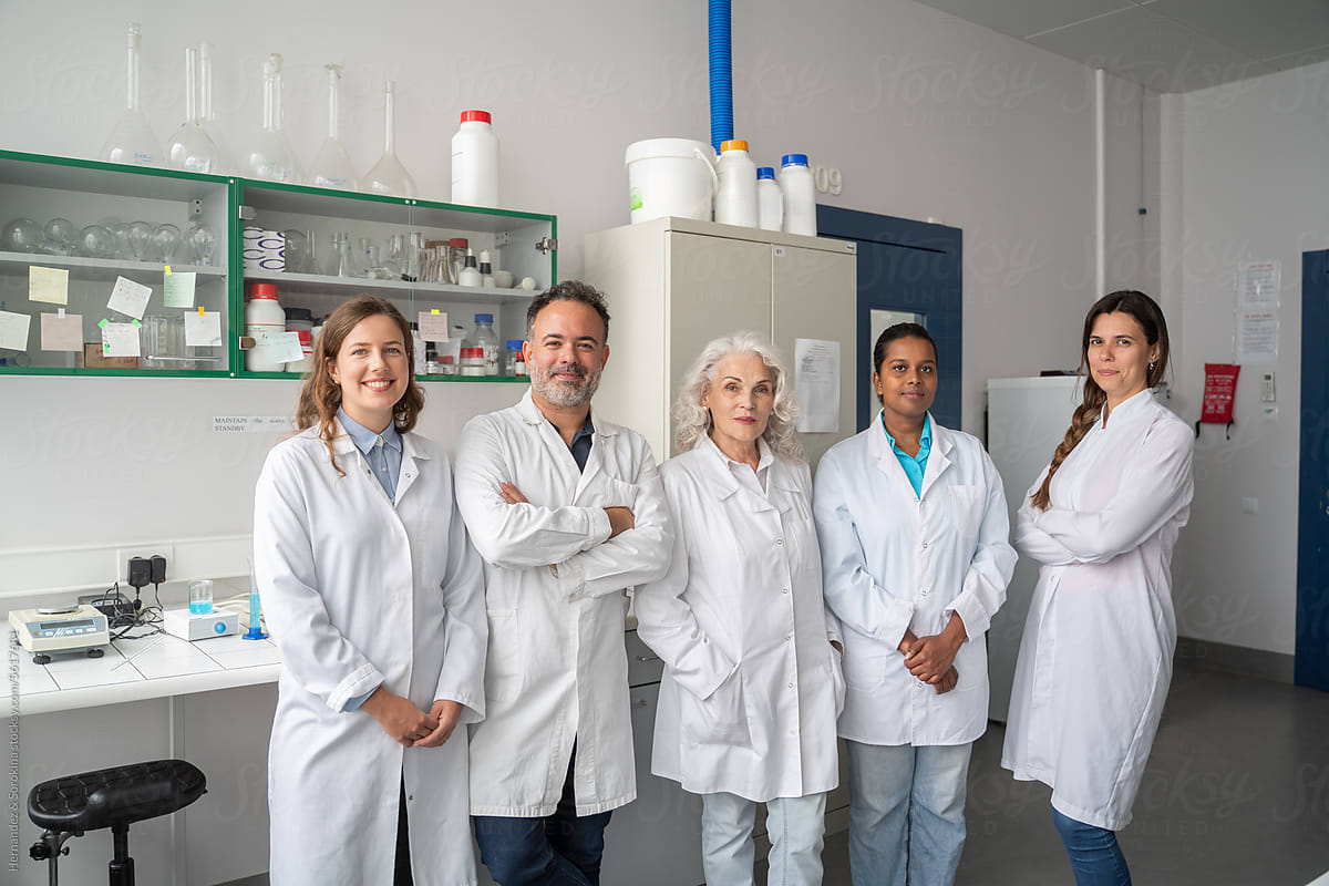 Diverse Group Of Researchers In Modern Laboratory