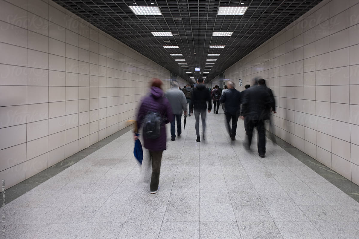 Underground corridor with blurred people