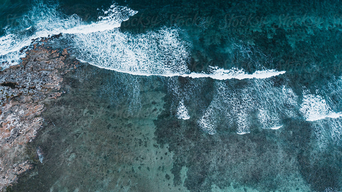 Drone View Of A Tropical Beach - coral reef with transparent water