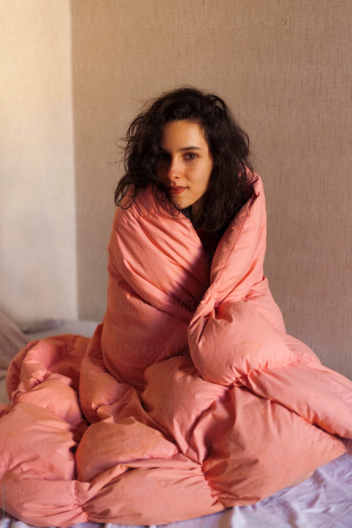 Portrait Of A Brunette In Her Bed Covered By Pink Sheet Del 4104