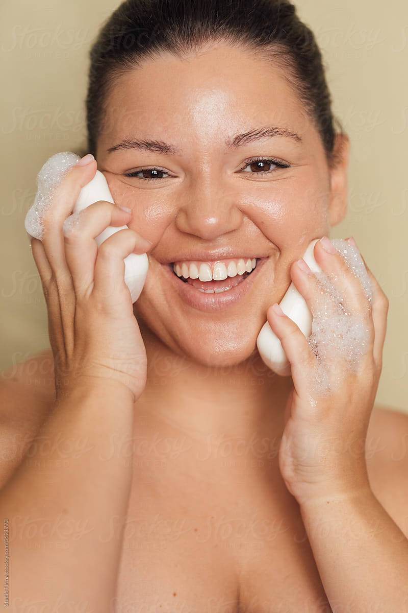 Woman Washing Face with Soap
