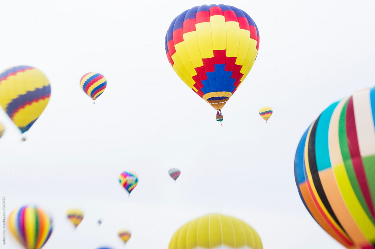 Colorful hot air balloons on white