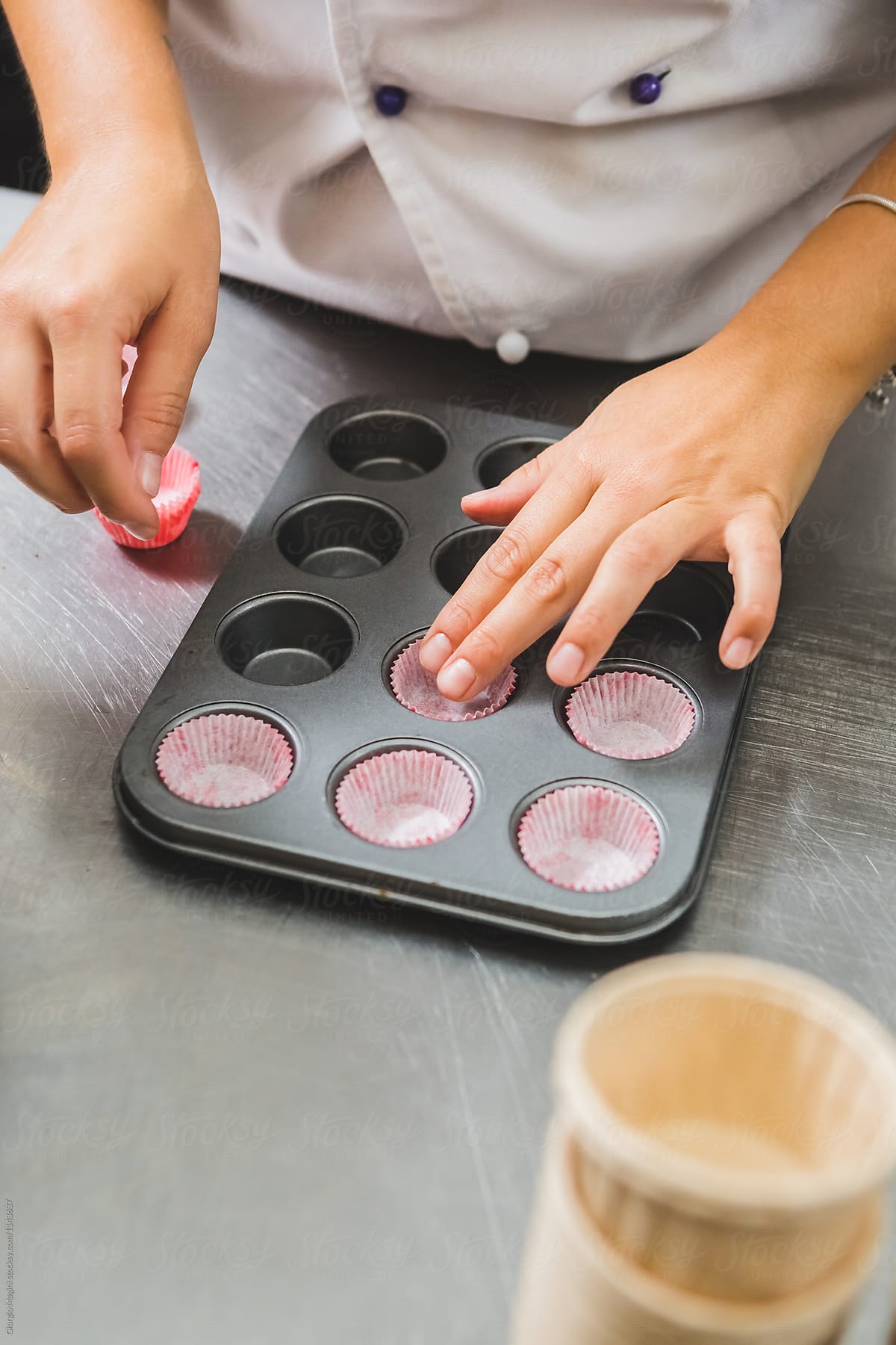 Pastry Chef Preparing a Small Tray for Chocolate Muffins