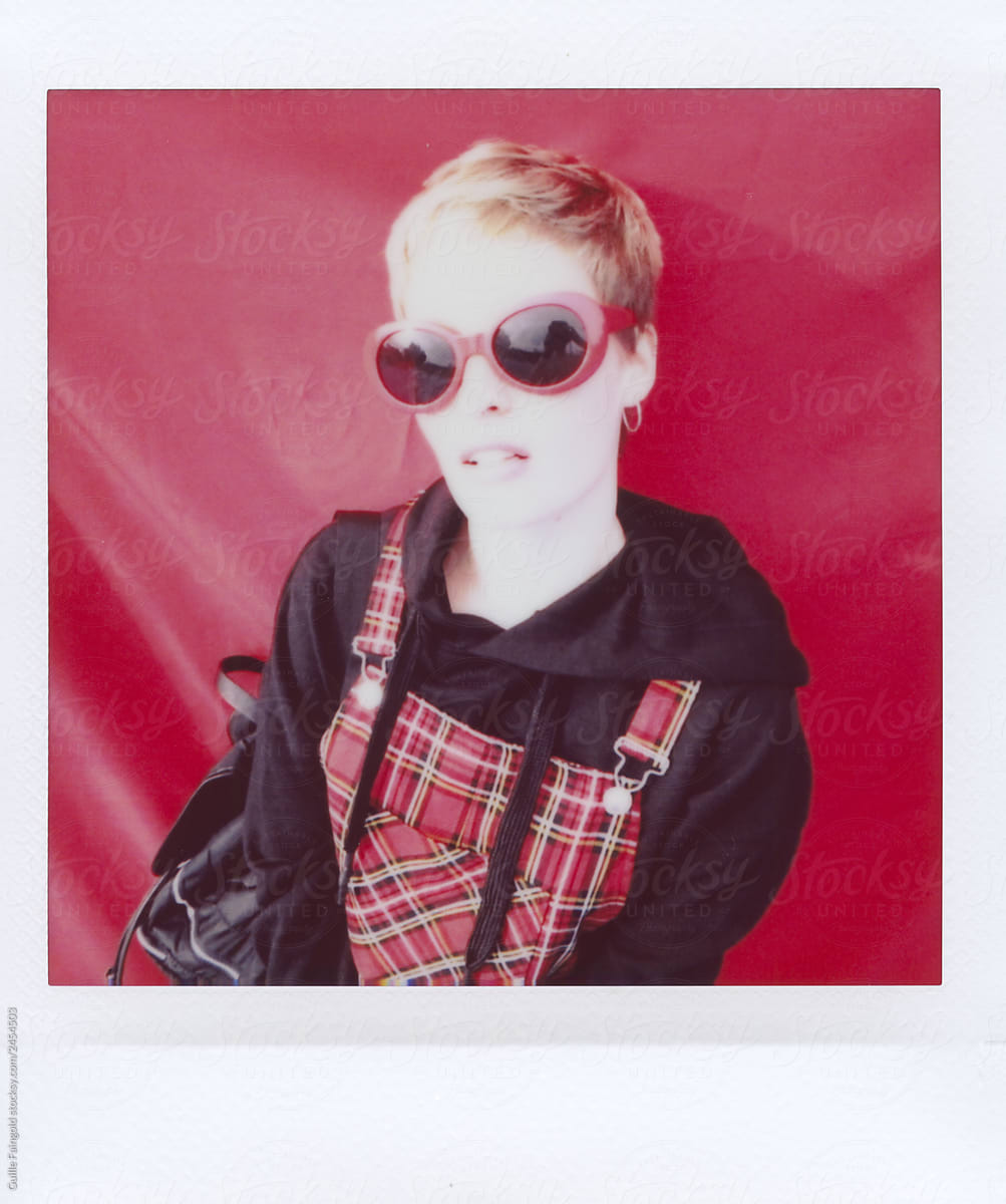 Blonde woman in sunglasses.