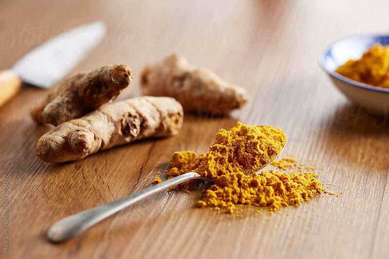 Close-up of turmeric powder in spoon