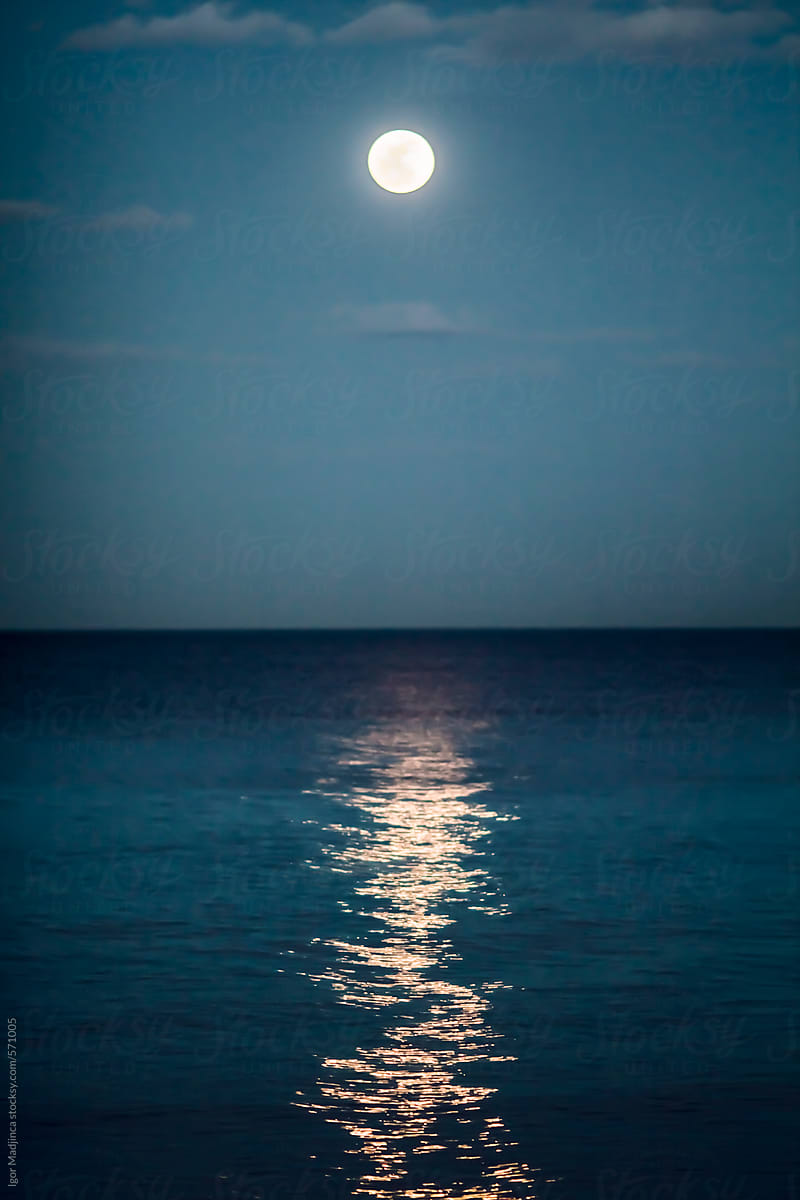 night,reflection of the full moon in the sea, colorful