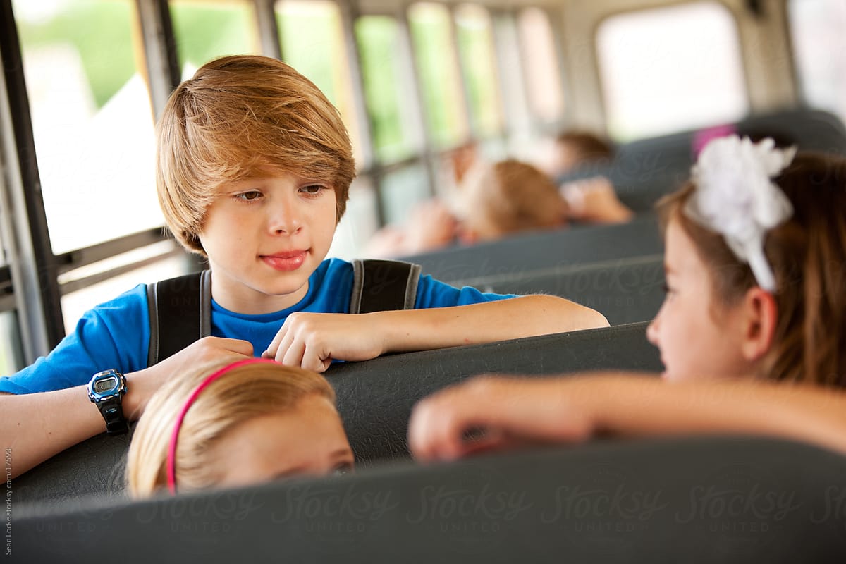 School Bus: Schoolboy Talking with Friends