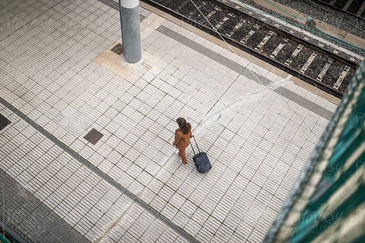young woman in train station