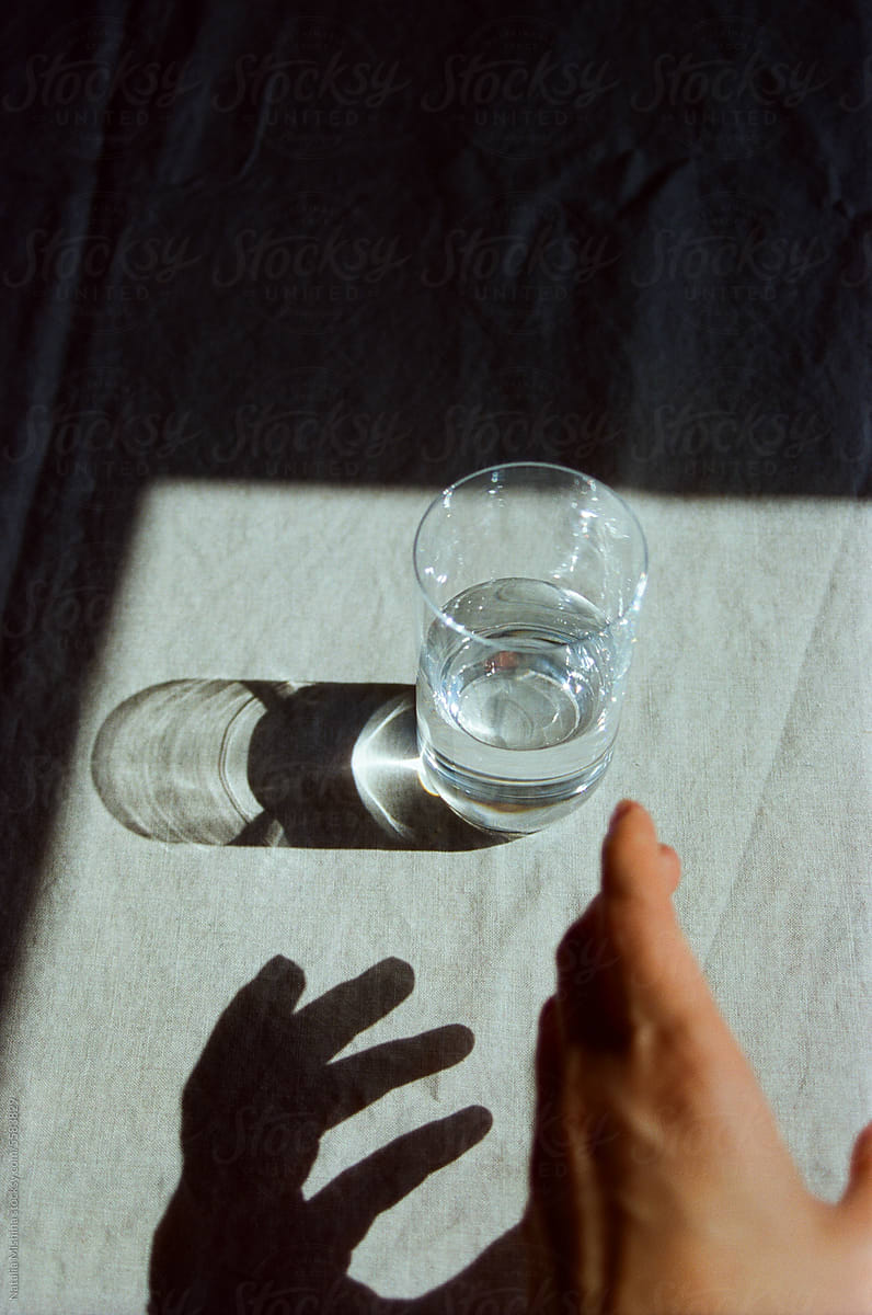 А half-filled glass of water.