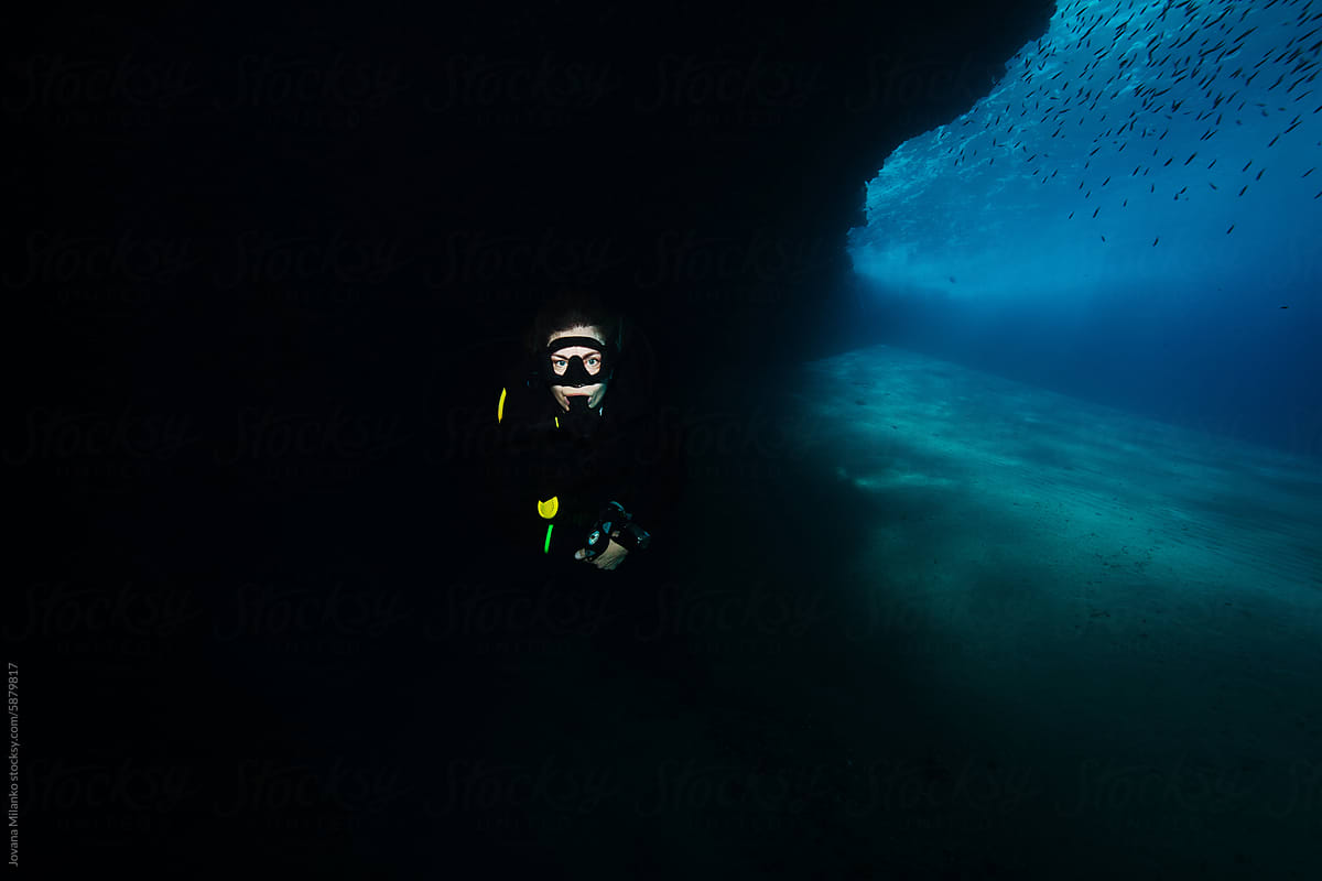 Active woman scuba diver enjoying peace and quiet