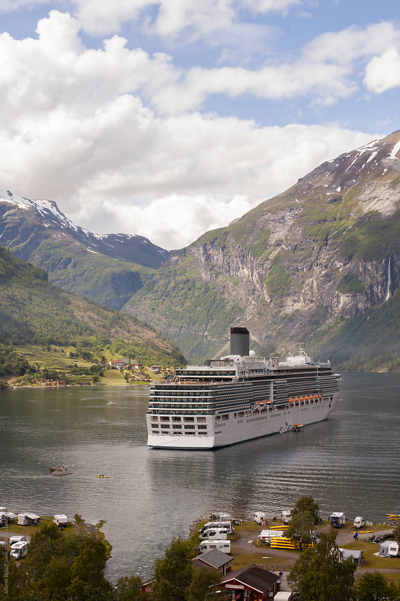 Cruise ship anchored in Geiranger Fjord, Norway