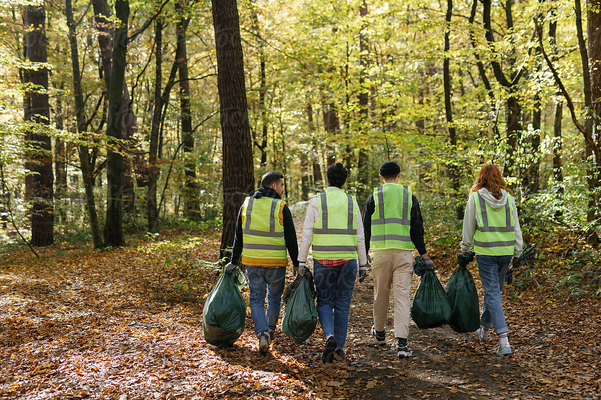 anonymous activist volunteers clean up litter outdoors