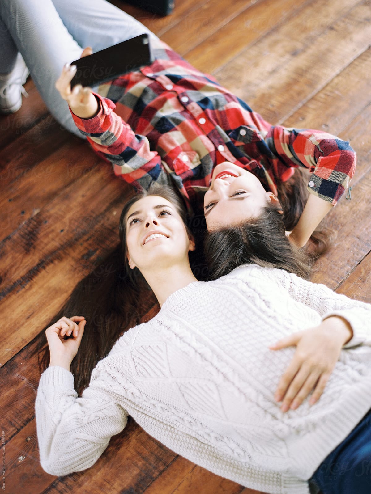 Women Taking Selfie On Floor Del Colaborador De Stocksy Alexandr Ivanets Stocksy 