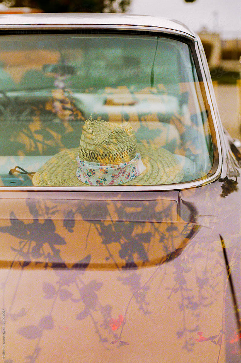 Summer hat in the back of a car.
