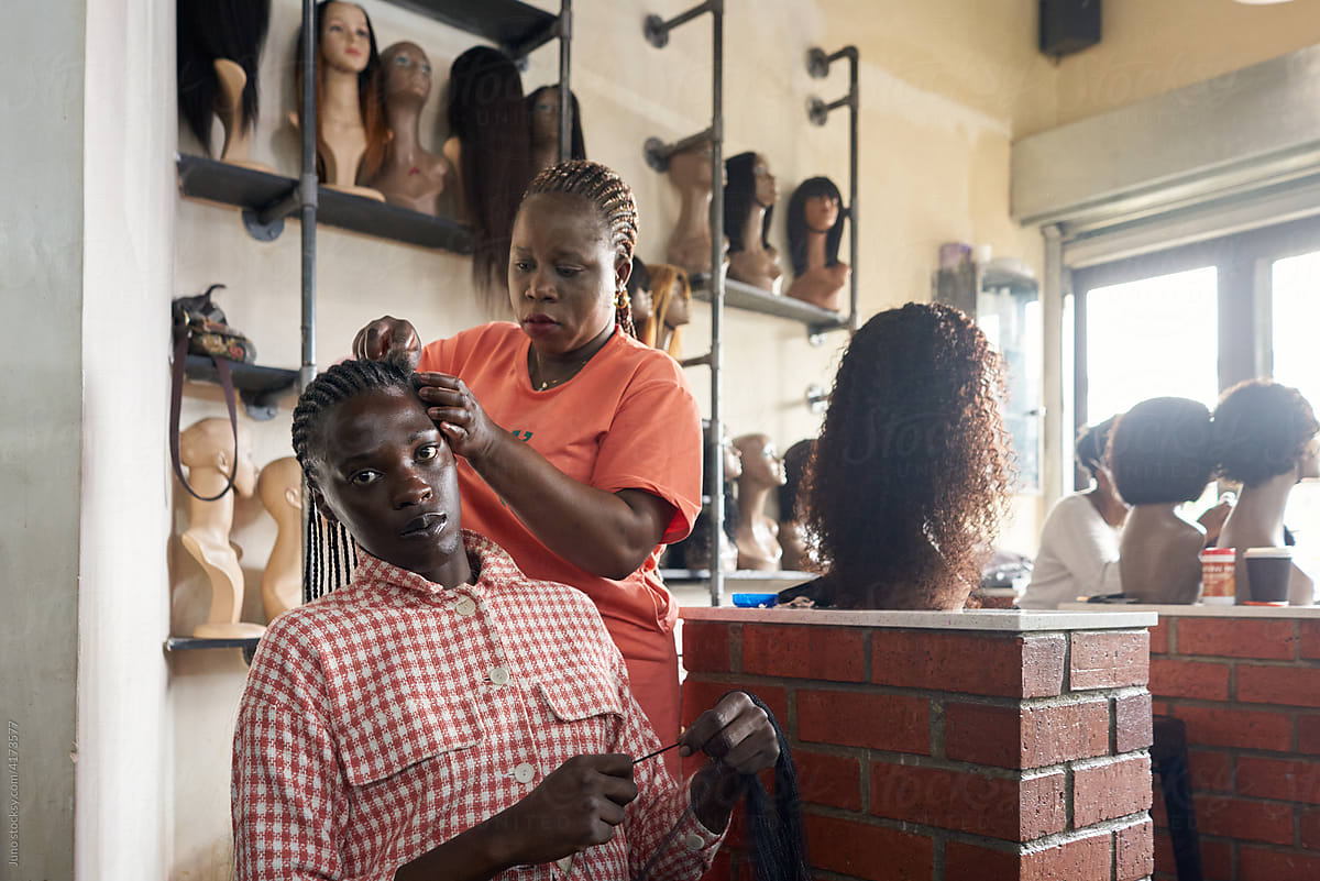 Hairdressing At A South African Hair Salon" by Stocksy Contributor "Juno" - Stocksy