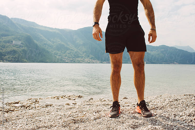 Man running by the lake