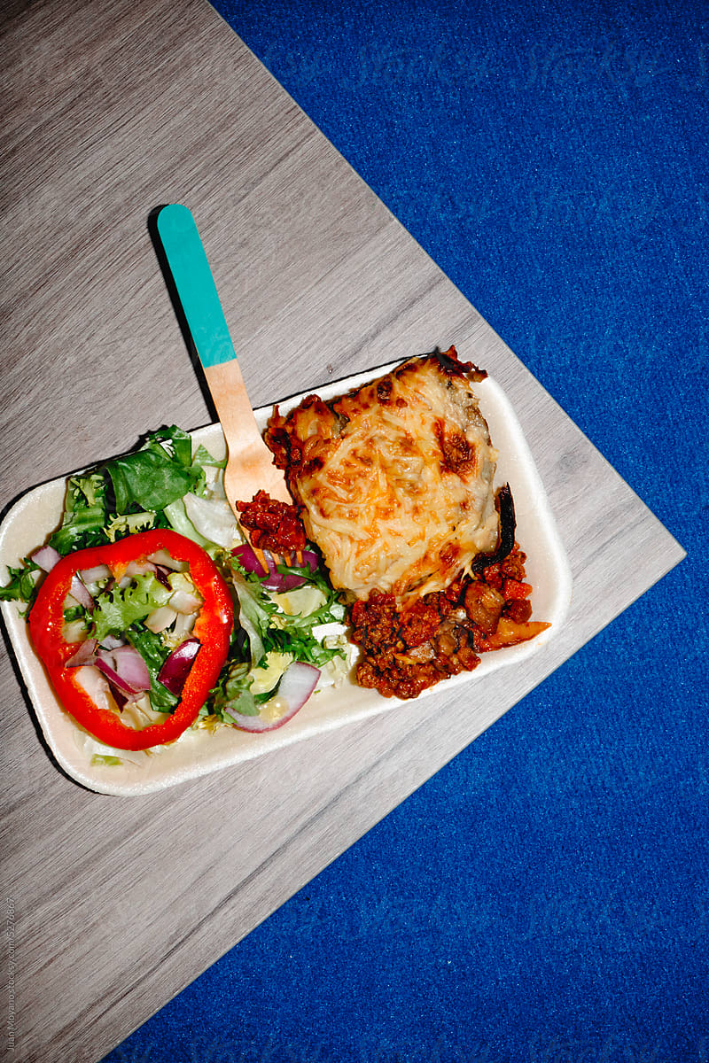 salad and moussaka on a table