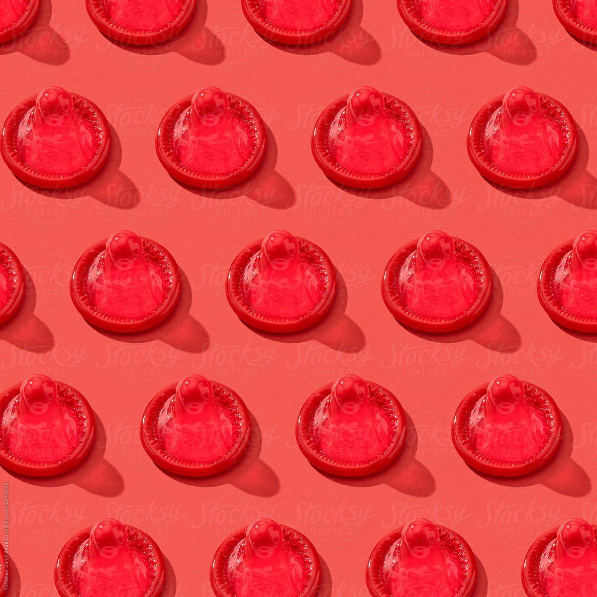 Set of bright red condoms