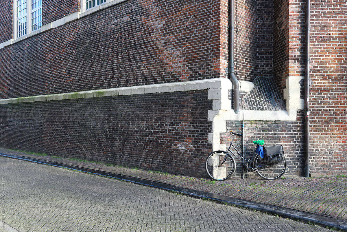 brick wall with bicycle