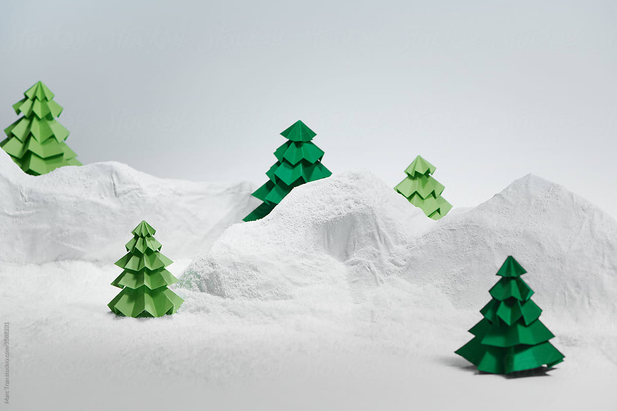 model Christmas landscape with kirigami, fold and cut, trees, snow