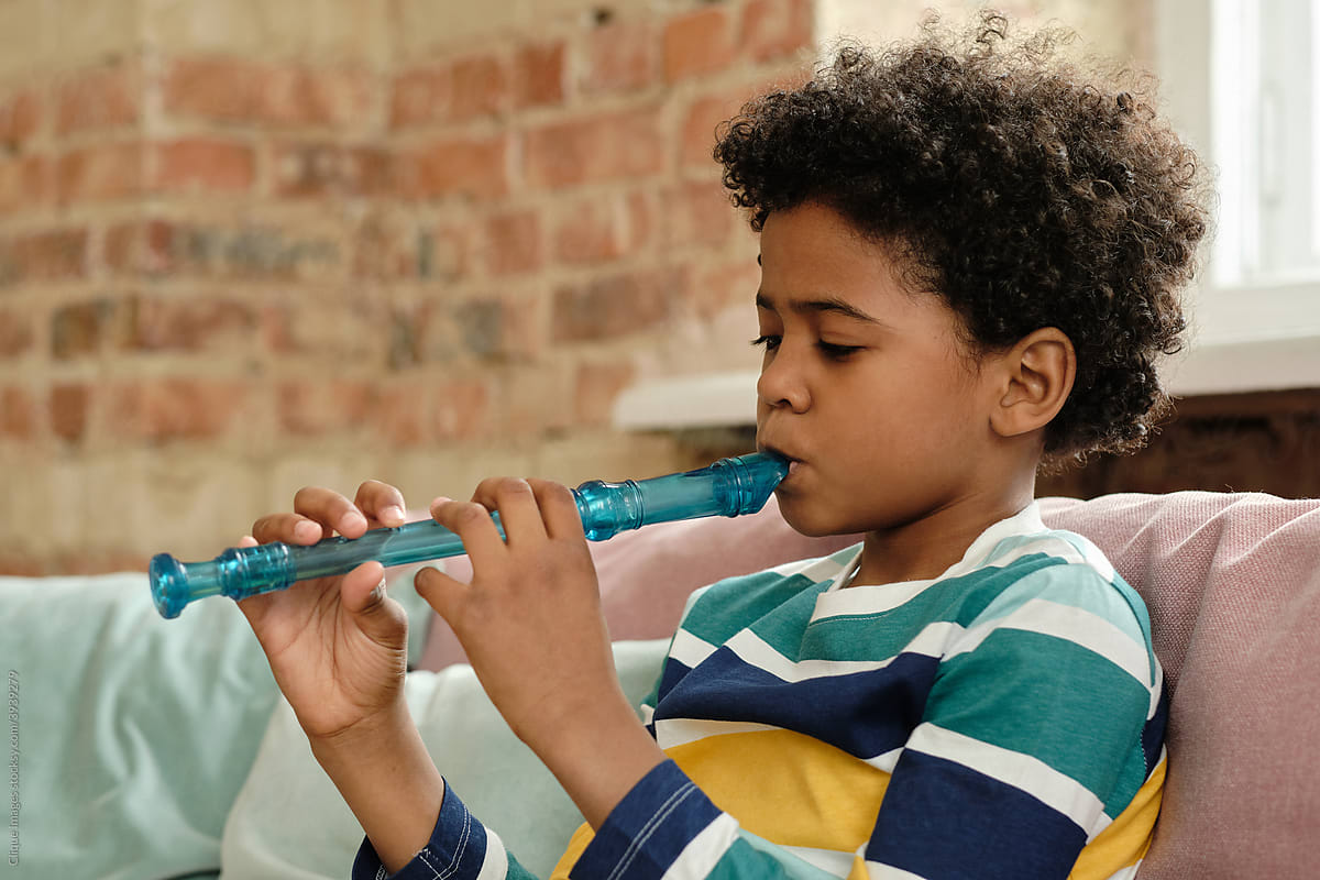 African-American Boy Playing Flute