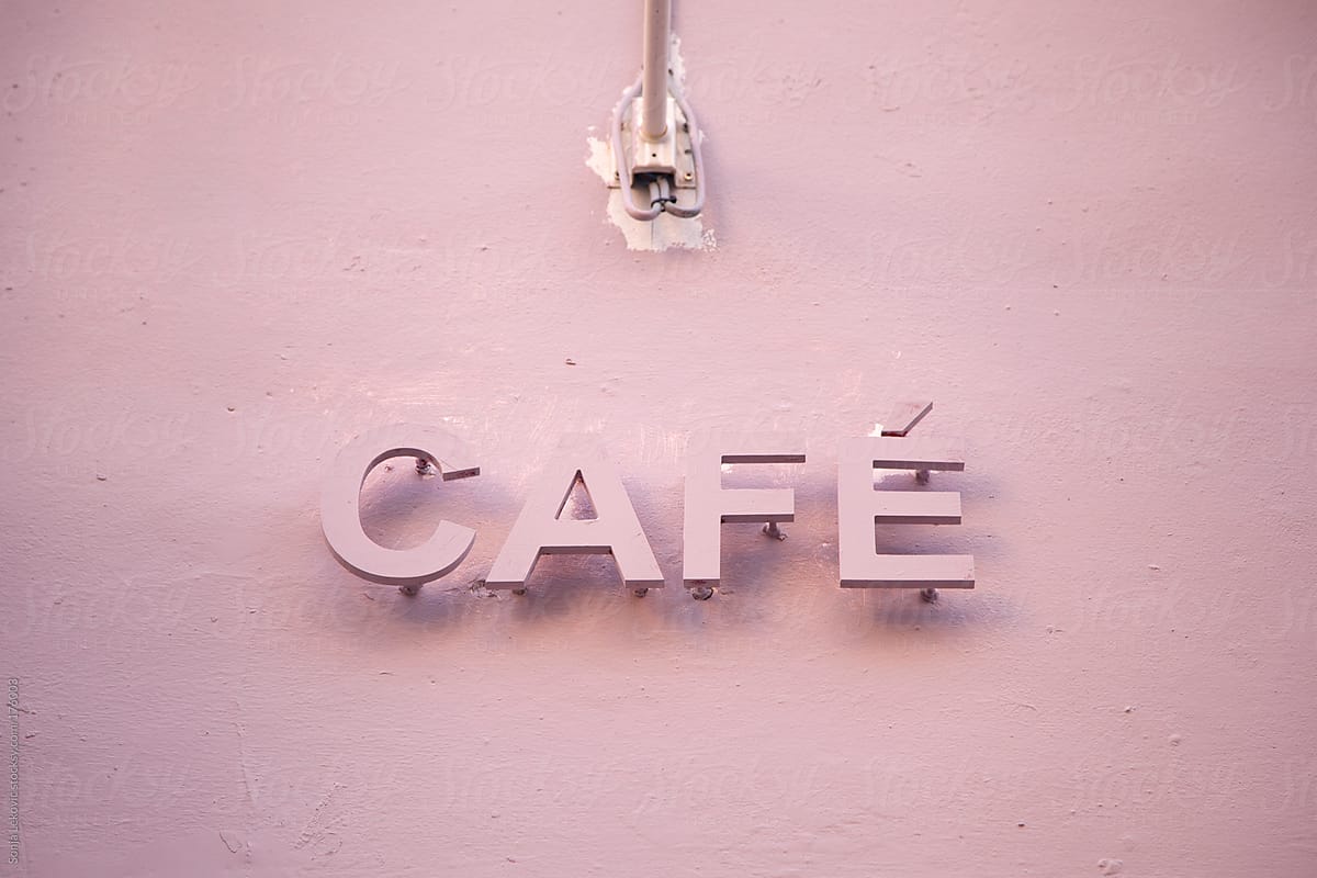 French Cafe Sign On A Pink Wall By Sonja Lekovic Stocksy United