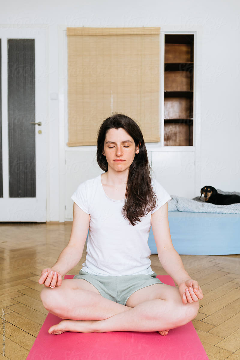 Adult woman meditating in the morning