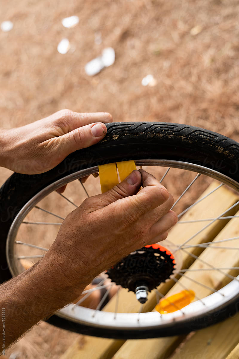 Man repair bike tire