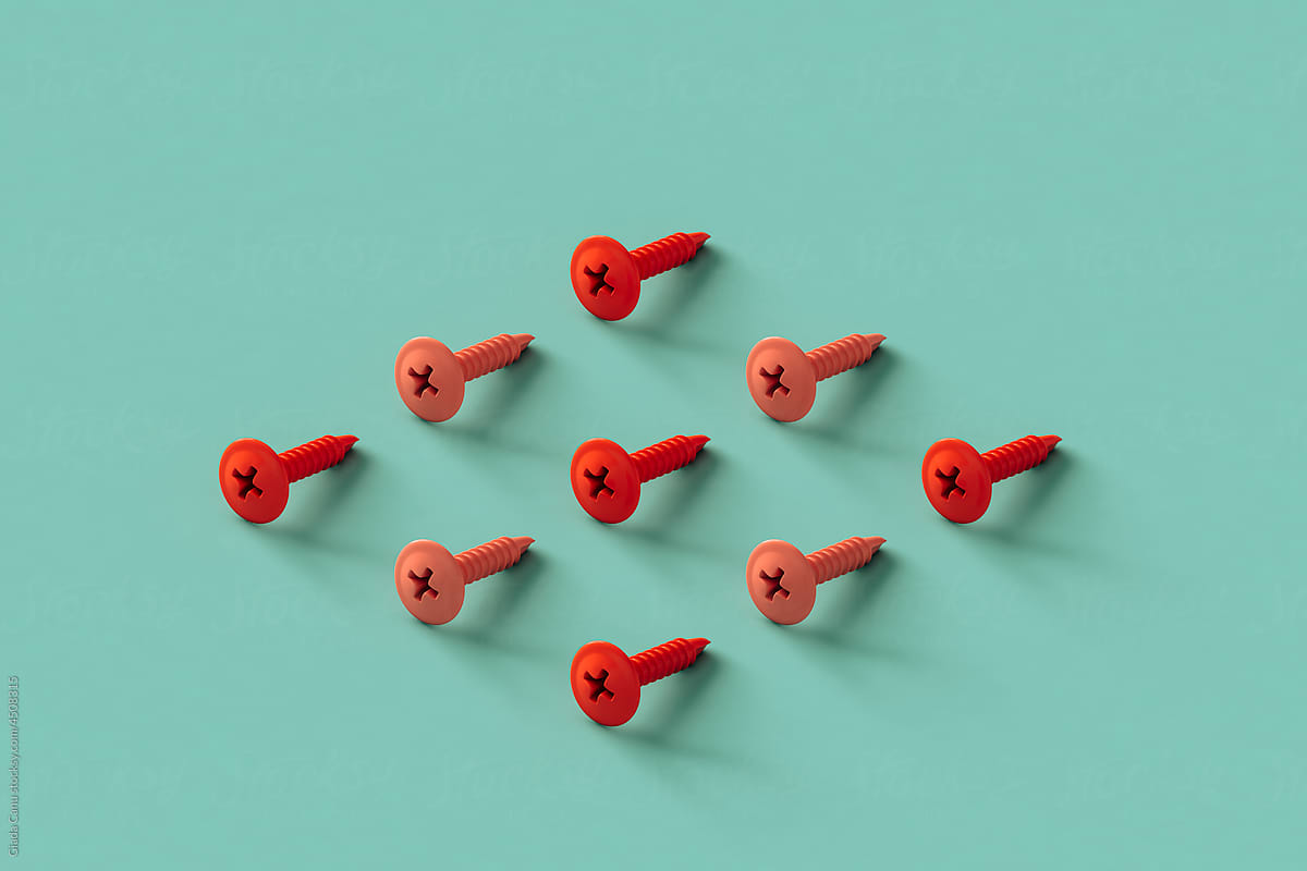 collection of pink screws with copy space