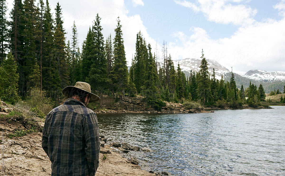 Man walking near a lake in Colorado