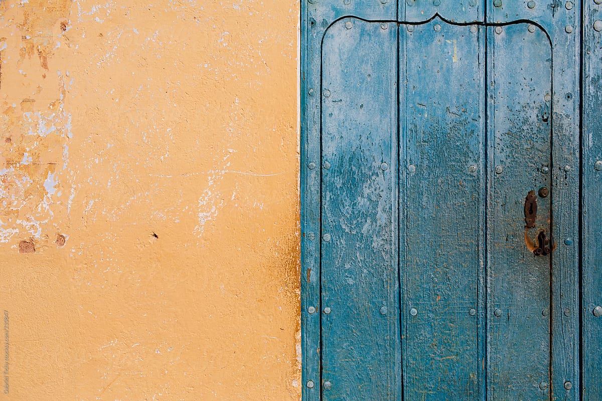 Blue door next to orange wall