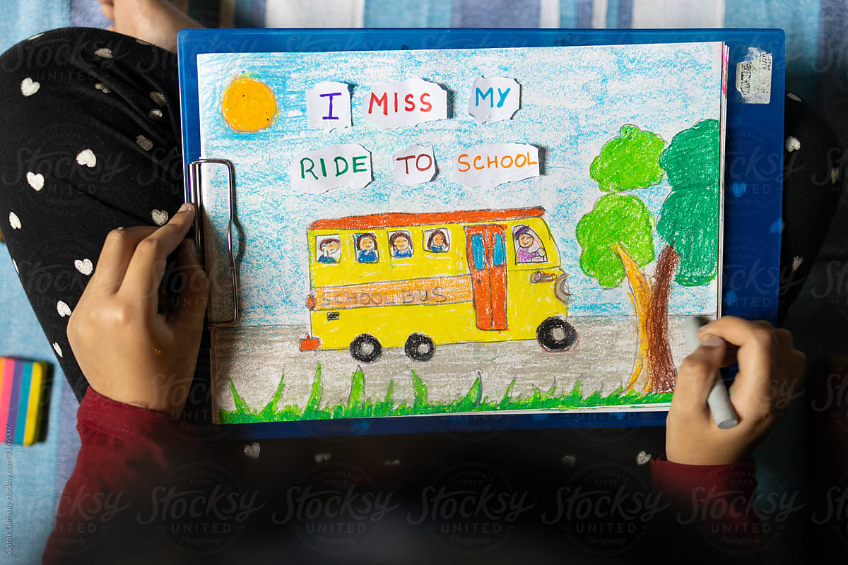 Child drawing school bus and missing her ride to school ,quarantine days
