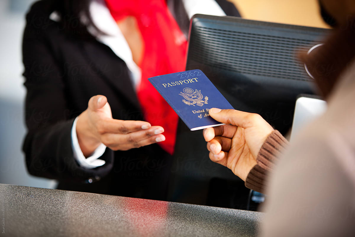 Airport: Handing a Passport to the Ticket Agent