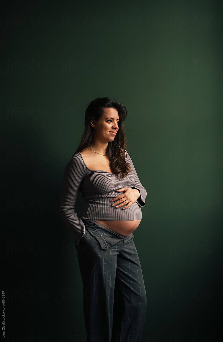 Beautiful Pregnant Woman Posing in Studio