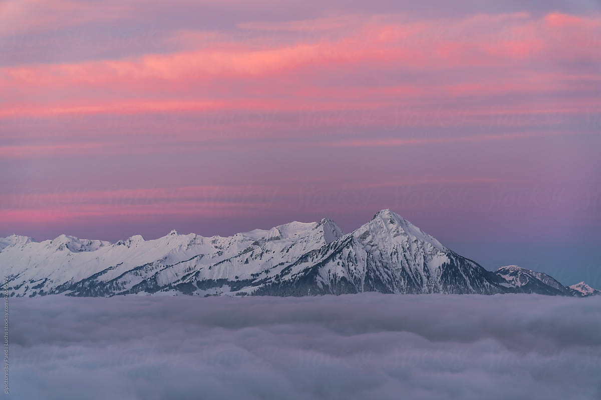 Mountain range and sunrise colors.