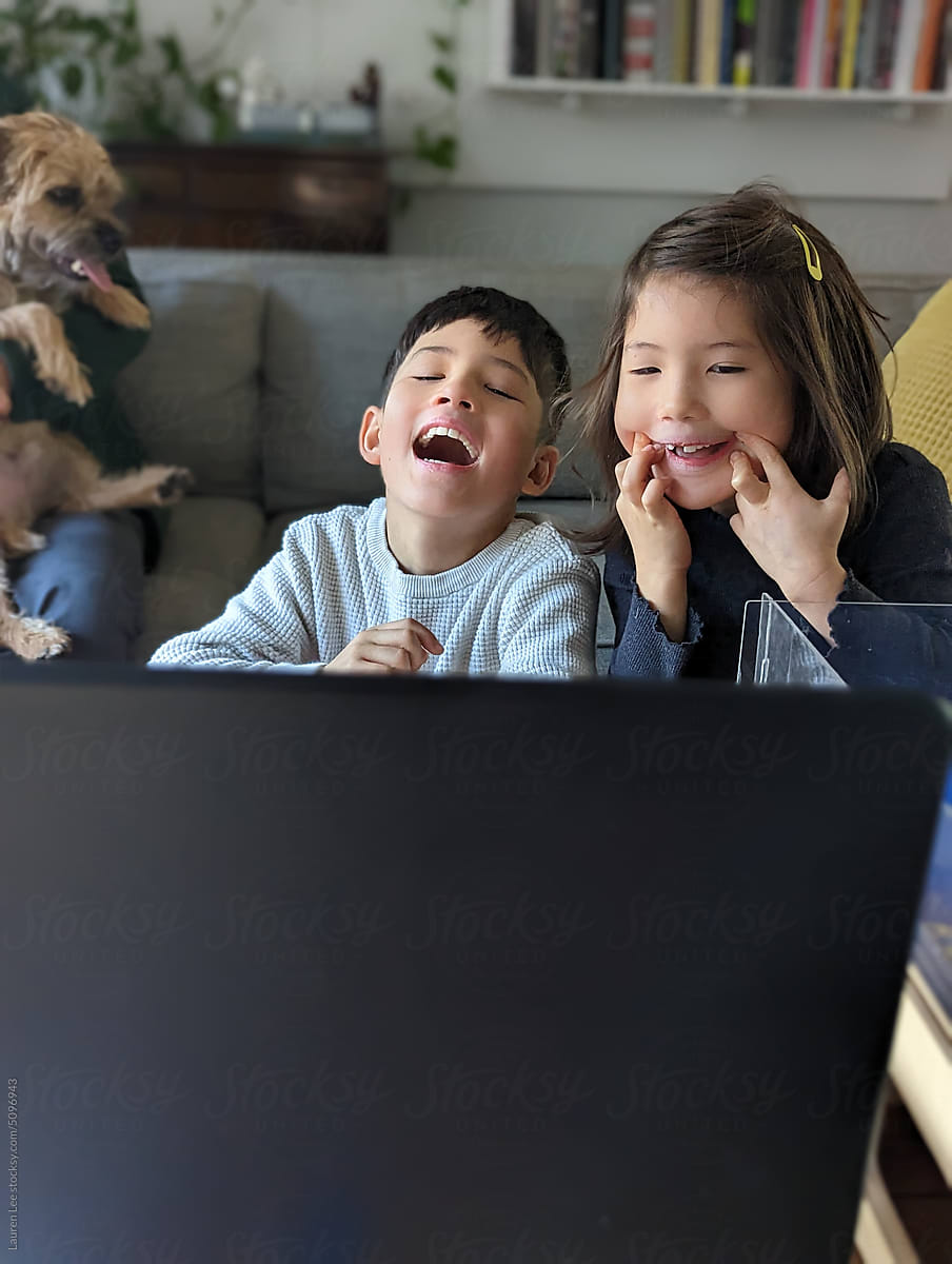 Happy kids on the computer