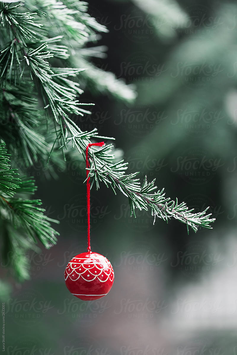 Hand painted Christmas ball on tree