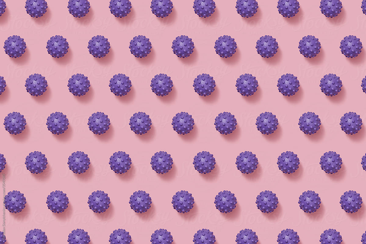 Horizontal pattern from purple spiky balls toys.