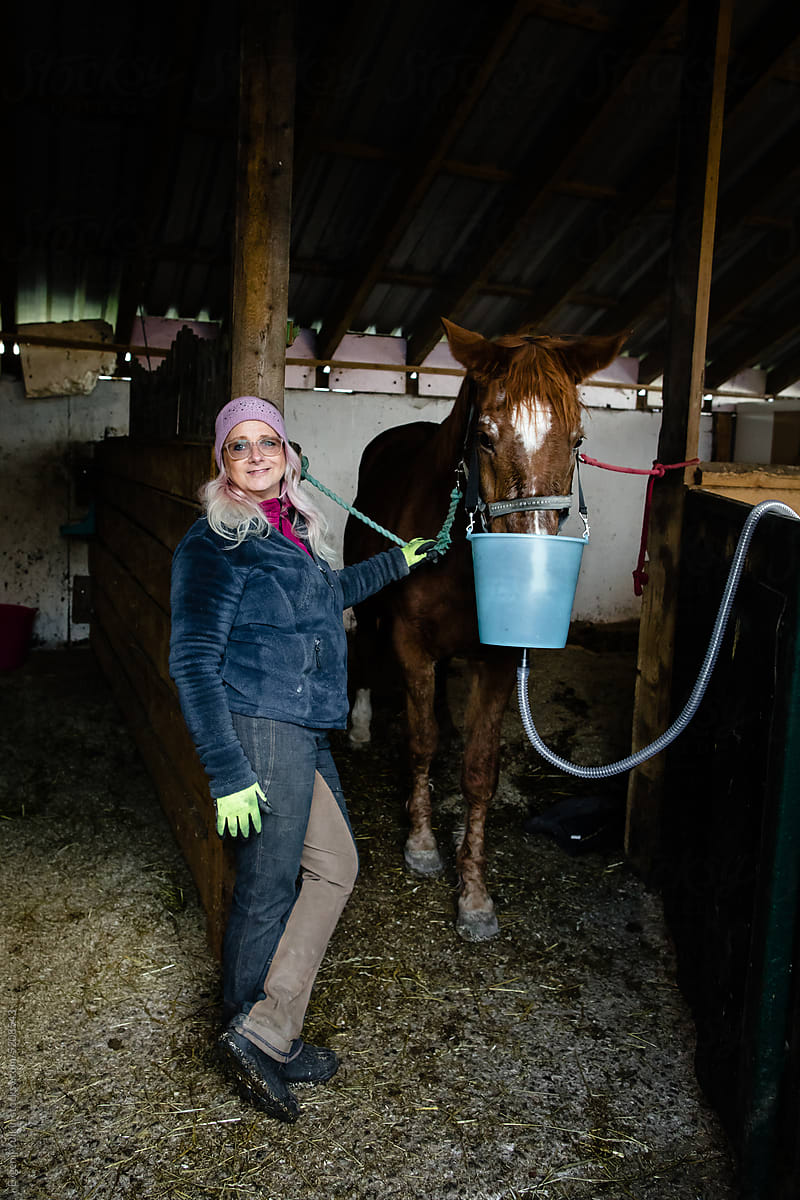 Woman and horse with inhalator