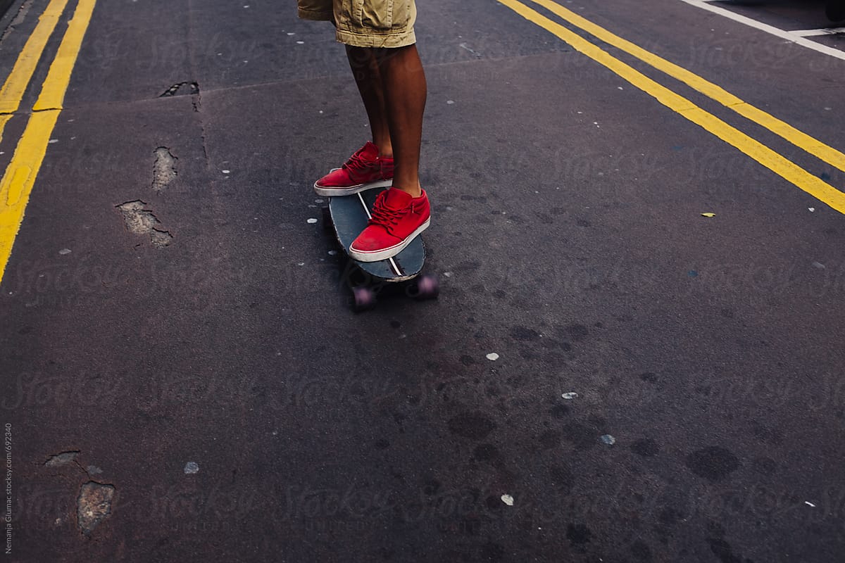 Man Riding Skateboard in Hong Kong
