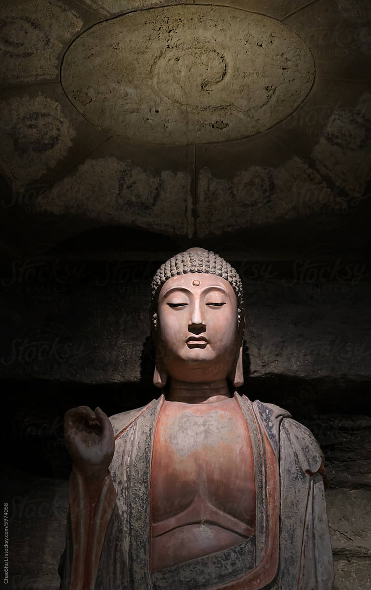Ancient Chinese stone carvings of Buddha statues in temples